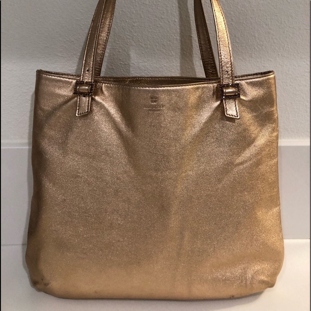 Kate Spade rose gold metallic leather purse. Measurements are approximate.